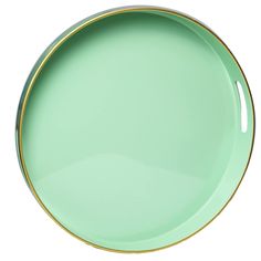 an empty green plate with gold rim