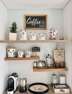 shelves with coffee cups and other items on them