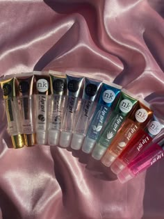 Description: 🌟 Contains Vitamin E 🌟 Hydrating 🌎 Worldwide shipping 💯 Quality products 📦 Rapid delivery Nk Makeup Lip Gloss, Nk Lip Gloss Collection, Lip Gloss For Black Women, Nk Lip Gloss, Lipgloss Collection, Lip Combos, Lip Gloss Cosmetics, Girl Heaven, Lip Balm Collection