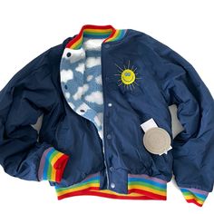 Stella Mccartney Size 12 New With Tags Reversible Bomber Jacket Snap Closure Embroidered Sun On Navy Blue Side Of Jacket Rainbow Stripe Detail At Bottom Of The Jacket, Sleeve Cuffs And Collar. Bin E Smiley Face Jacket, Varsity Jacket Custom, Primary Color Fashion, Male Kidcore Outfits, Color Block Varsity Jacket, Fun Mens Fashion, Kidcore Fashion Men, Coraline Fashion, Clown Jacket