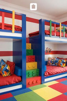 there are two bunk beds made out of legos in this room with colorful carpeting