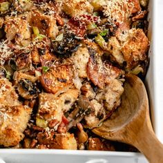 a casserole dish with meat and vegetables in it