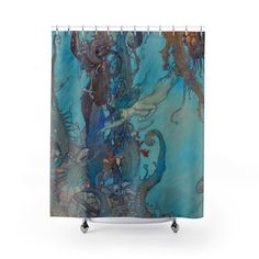 a shower curtain with an image of a mermaid and octopus in the ocean on it