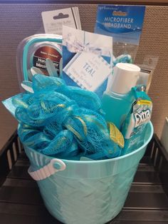 a blue bucket filled with personal care items