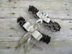 two wedding garters with bows and pearls