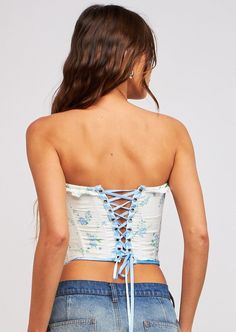 Strapless corset with hook and eye front closure Blue lace-up velvet tie backing Size and Fit: Model height 5'8" wearing size Small Blue Corset Top, Moon Top, Velvet Tie, Blue Corset, Strapless Corset, Long Sleeve Outerwear, Crop Top Sweatshirt, Little Outfits, Party Tops