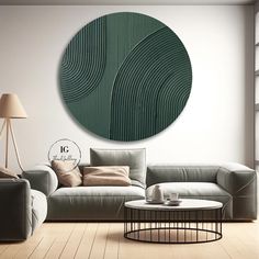 a living room filled with furniture and a large circular painting on the wall above it