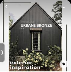 the front cover of urban bronze magazine, featuring an image of a black building with white trim