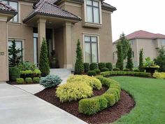 a house with landscaping in front of it