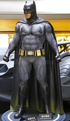 a batman statue is on display in the store