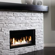 a white brick fireplace in a living room