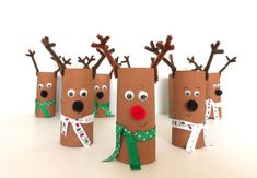 some toilet paper rolls with reindeer heads on them