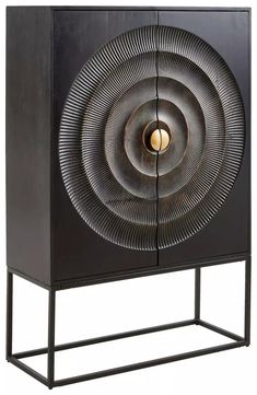 a black cabinet with a circular design on the front