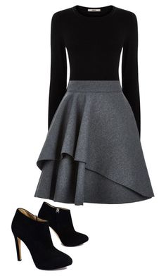 a black and grey dress with high heels