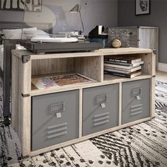 a record player sitting on top of a wooden cabinet