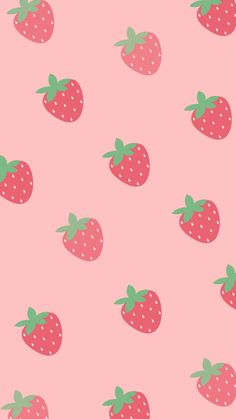 a pink background with strawberries on it