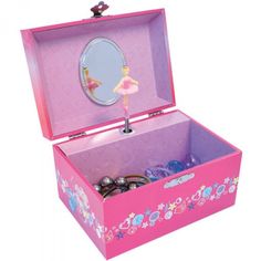 a pink box with a ballerina figure in the lid and various other items inside