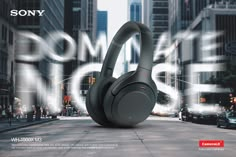 an advertisement for sony's new headphones is shown in the middle of a city street