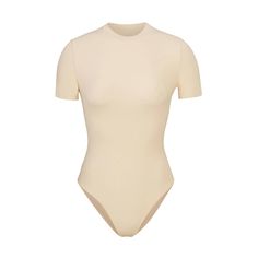 Like your favorite tee, but better! This molds-to-your-body short sleeve bodysuit features a buttery soft fabric, high crew neckline, and brief back for... Cheap Fitted Bodysuit With Funny Text, White Long Sleeves, Waist Shapers, Shirt Bodysuit, Brown Shorts, Short Sleeve Bodysuit, Crew Neckline, Soft Fabric, Stretch Fabric