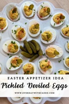 deviled eggs with pickles and capers on a white platter for an easy appetizer idea