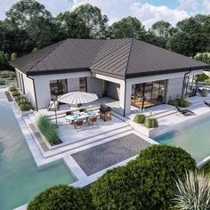 an artist's rendering of a modern house in the middle of a pool area