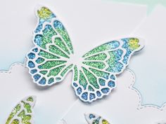 a close up of a butterfly on a card