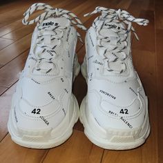 There Are Lightly Used White Triple S Allover Logo Balenciagas They've Only Been Worn A Handful Of Times. They Have A Few Minor Scuffs That You Can Sew In The Photos But Other Than That They Clean And Look Pretty New! And It Come With The Shoe Box,String Dust Bag And Extra Pair Of Shoelaces. Please Only Buy If You've Looked At All The Pictures And Are Okay With The Scuffs It Has Besides That They Have Some Light Wrinkles But Are Barely Noticeable With All The Lettering Around The Shoe. Shoes Balenciaga, Balenciaga Shoes, Sew In, White Shoes, Shoe Box, Mens Shoes Sneakers, How To Look Pretty, Shoe Laces, Wrinkles