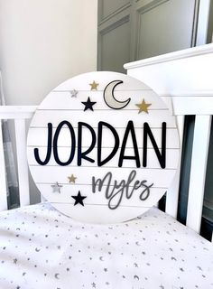 a wooden sign that says jordan my life is written on the side of a bed