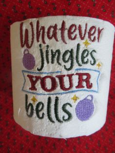 a close up of a piece of cloth with writing on it that says whatever juggles your bells