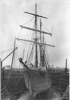 an old black and white photo of a ship