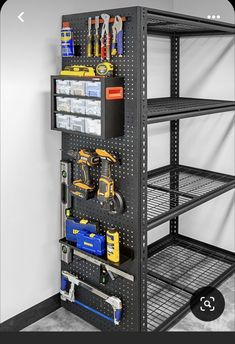 a metal shelving unit with tools on it