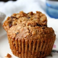 a muffin sitting on top of a white plate