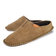 PRICES MAY VARY. GENUINE LEATHER UPPER: The genuine suede upper is comfortable and durable. INDOOR / OUTDOOR USE: The rubber textured sole allows for moderate outdoor use, in addition to being a fully functional indoor slipper. COZY AND COMFORTABLE: The soft sherpa lining will make your feet feel like they’re floating in a cloud. These slippers will feel great barefoot or in socks. EASY ON/OFF: Step-in slipper style, has no lacing, so no hassle -- just comfort. THESE SLIPPERS RUN SMALL: We recom Indoor Outdoor House, Mens House Shoes, Leather Slippers For Men, Outdoor House, Rubber Texture, Slippers For Men, Leather Slippers, Kids Luggage, House Shoes