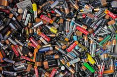 there are many different types of batteries in this pile, and one is full of them