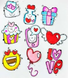 some stickers that are on top of a white board with hearts and cupcakes