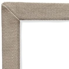 a close up view of the corner of a frame with an empty white paper in it