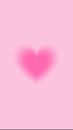 a pink heart on a pink background