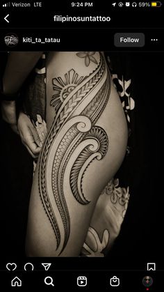 a woman's thigh with an intricate tattoo design on the side and bottom part