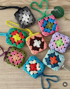 crocheted granny grannys are arranged on a table