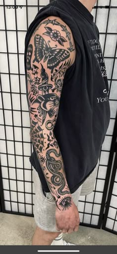 a man with a tattoo on his arm