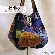 a handbag is shown with the name norko on it and an image of a flower