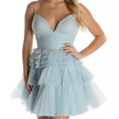 Sherri Hill Homecoming Dress In Light Blue, Worn Once For 3 Hours. Fun And Flirty With This Super Cute Short Dress By Sherri Hill Style 55209. This Aline Short Dress Is Fitted At The Top And Flowy At The Bottom. This Dress Features A V Cut Neckline And A Double Illusion Waistband To Keep You Looking Snatched All Night Long. The Ruffled Tulle Bottom Is Perfect For Any Occasion. The Back Of This Features A Zipper Closure And Same Open Cut As The Front. Sherri Hill Homecoming Dresses, Cherry Blossom Dress, Cute Short Dresses, Sherri Hill Dresses, Sherri Hill, V Cut, V Cuts, Homecoming Dress, Fall Outfits Women