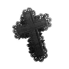 a black cross on a white background with lace around the edges and an intricate design