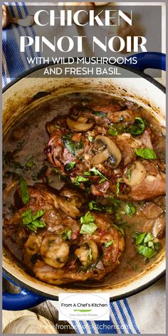 chicken pinot noir with wild mushrooms and fresh basil in a skillet on a table