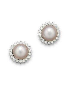 Cultured Akoya pearl stud earrings with a halo of diamonds set in 14K white gold. White Gold Pearl Earrings With Halo Design For Anniversary, Anniversary White Gold Pearl Earrings With Halo Design, Romantic Jewellery, Exclusive Jewelry, Akoya Pearls, Pearl Diamond, Pearl Stud Earrings, Pearl Studs, Pearl White