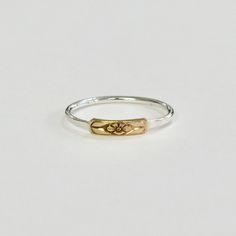 The wild pansy, with its characteristic five-petaled face, symbolized thoughtfulness in the Victorian language of flowers. Wear this ring when you want to keep someone or something in your thoughts, or give it to the one who you are thinking of.  A stylized flower made of 14 karat gold forms the centerpiece of this delicate ring. A simple silver band modernizes the traditional motif. The ring is low-profile, making it easy to wear and mix with other styles. - 14k gold and sterling silver in a hi Victorian Language Of Flowers, Victorian Language, Wild Pansy, Gold And Silver Ring, Ring Flower, Gold And Silver Rings, Language Of Flowers, Delicate Rings, Gorgeous Jewelry