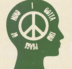 a person's head with a peace sign on it