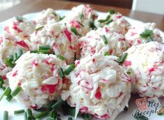 there are some food on the plate and one is covered in red and white sprinkles