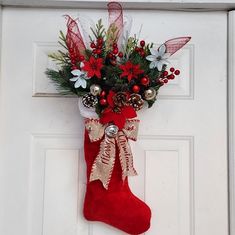 a christmas stocking hanging on the front door