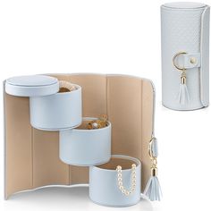 three white jewelry boxes are shown with one open and the other closed to show it's contents